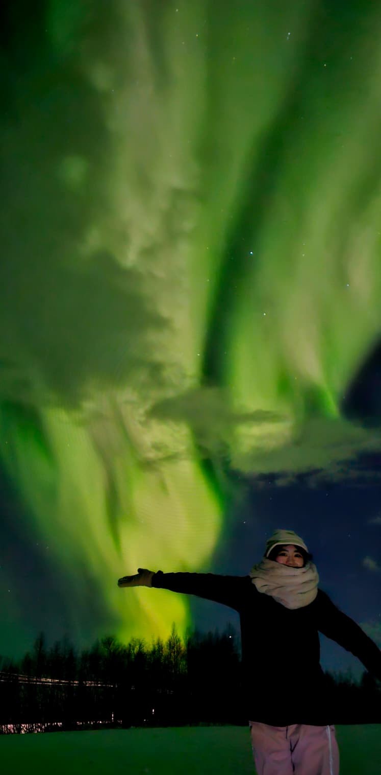 Northern lights above the winter landscape near Kiruna
