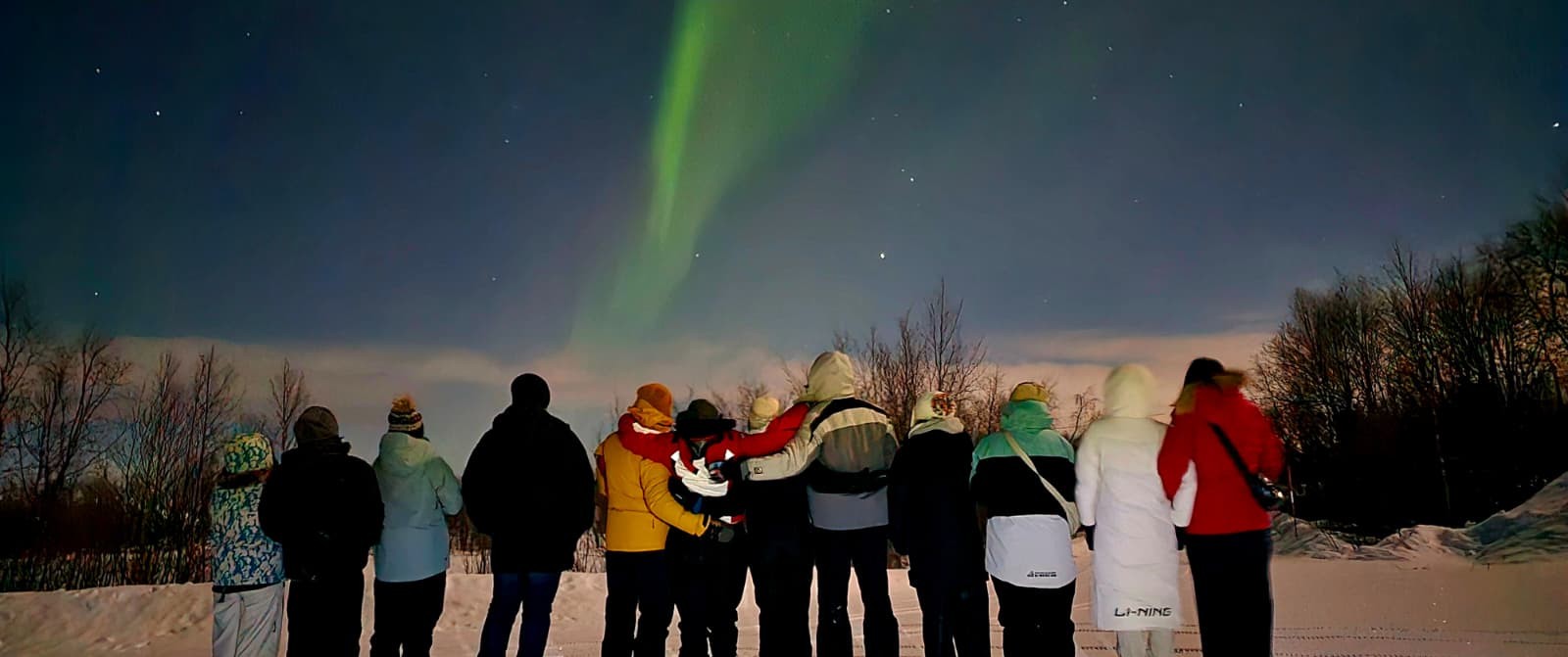 Dancing aurora ribbons over Kiruna wilderness